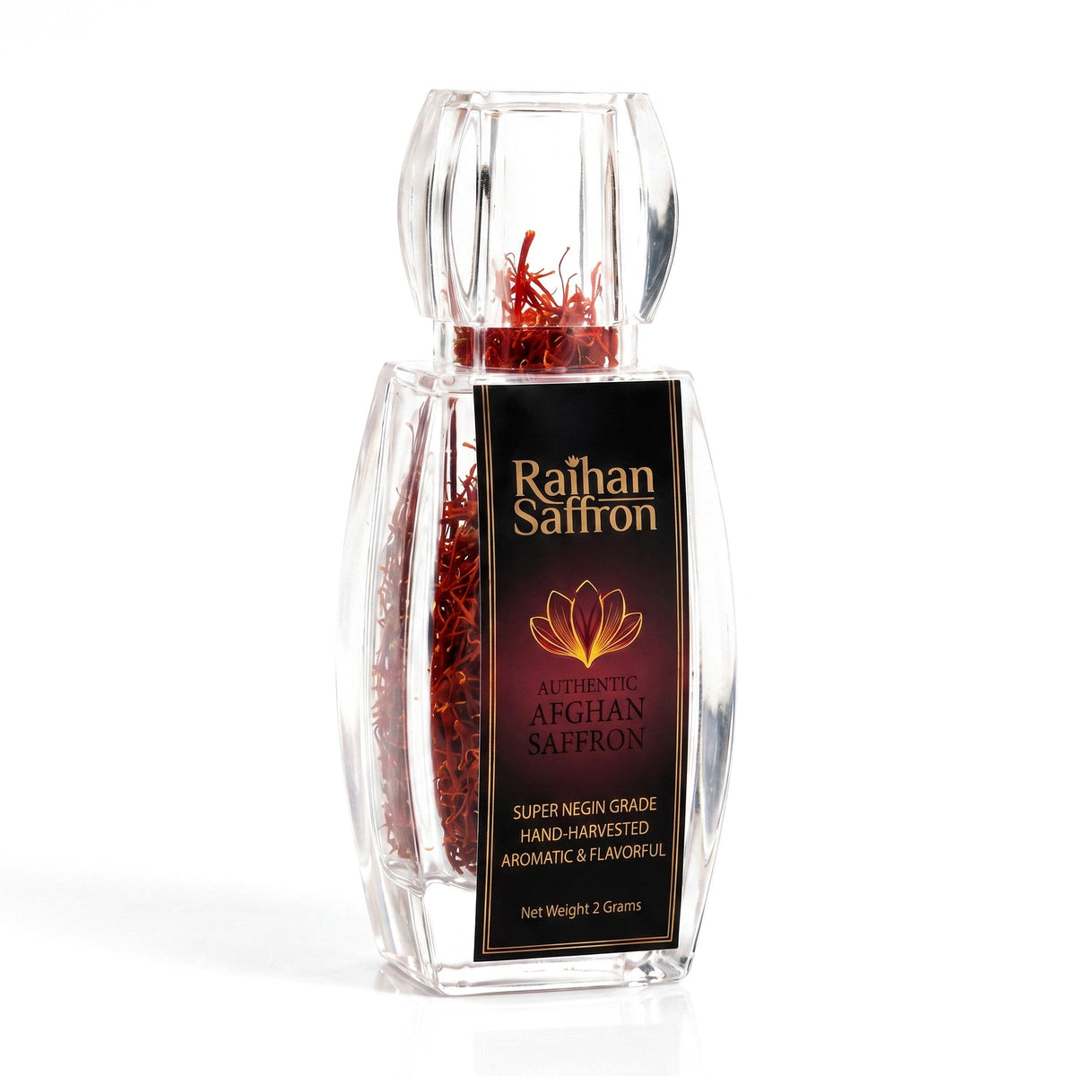 Raihan Afghan Super Negin saffron threads in a crystal-clear bottle, white background