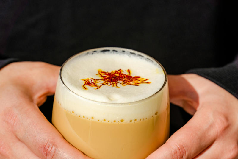 Afghan saffron chai in a clear glass