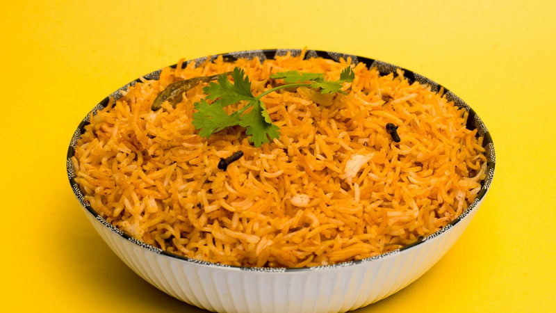 Fluffy Afghan saffron basmati rice with gold streaks, made with Raihan Afghan Super Negin saffron