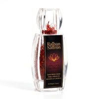 Raihan Afghan Super Negin saffron threads in a crystal-clear bottle, white background