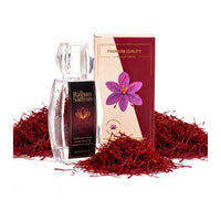 Raihan Saffron Afghan Super Negin saffron threads: crystal-clear bottle, gift box and a heap of whole deep-red threads on a white background
