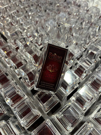 Raihan Saffron glass bottle on the packing line — authentic Afghan Super Negin, hand-packed in Lynn MA