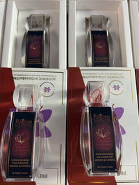 Raihan Saffron bottles nested in white presentation gift boxes — packed by hand in Lynn, Massachusetts