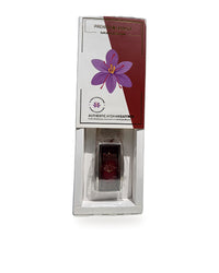 Raihan Saffron drawer gift box open showing the sealed crystal-clear bottle of Afghan Super Negin saffron, as your order ships